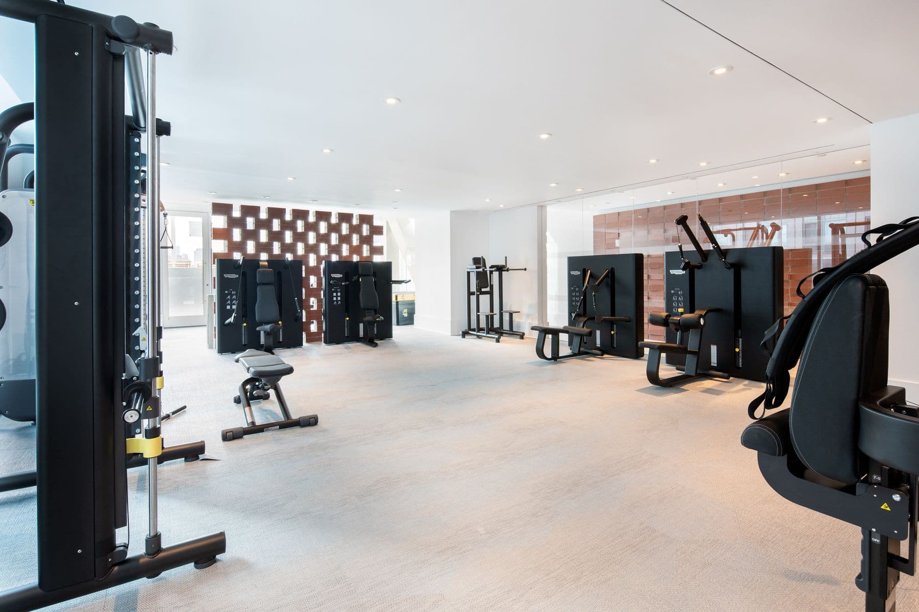 420 Kent - Fitness center with high end workout machines in spacious area