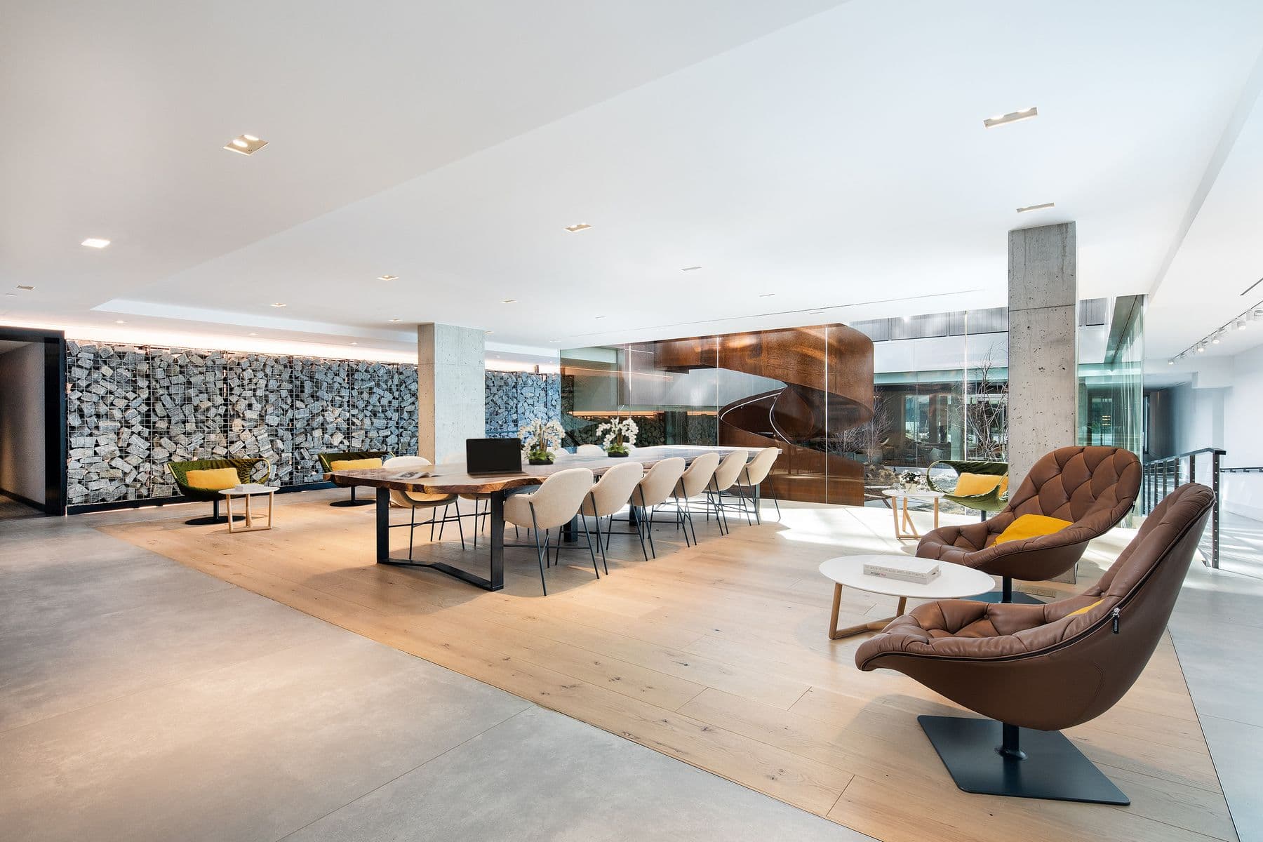420 Kent - Quiet lounge with conference table and chairs, side seating with small tables, wood floors, modern and bright