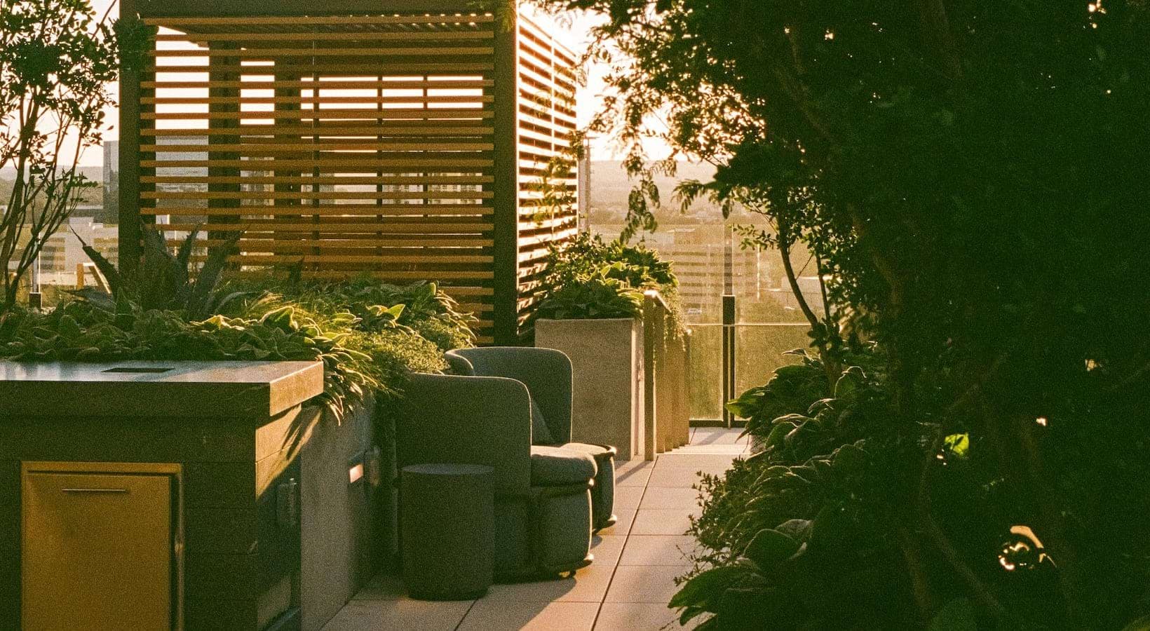 outdoor patio with lush landscaping