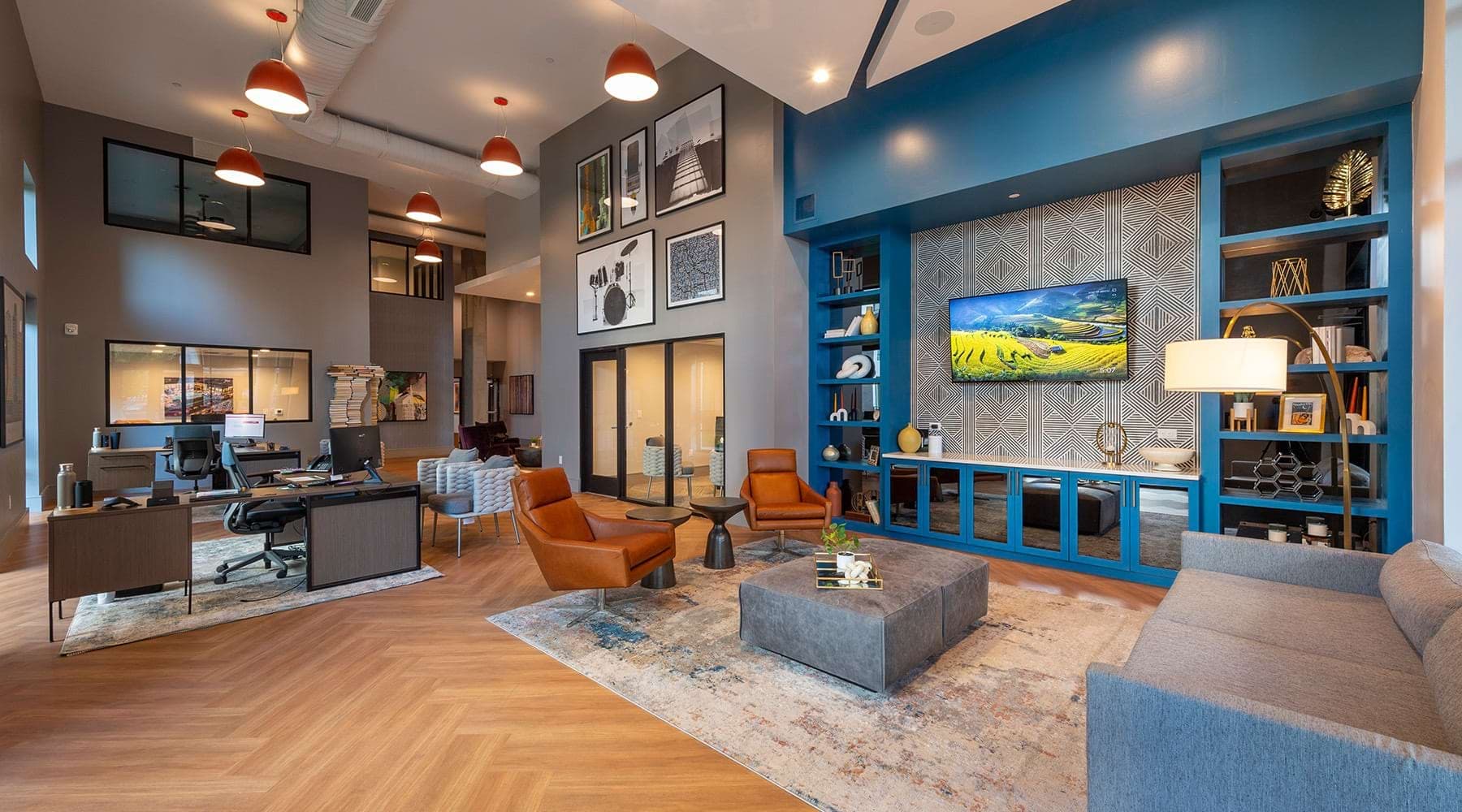 Aspire Gulch clubhouse lounge area with seating and tv