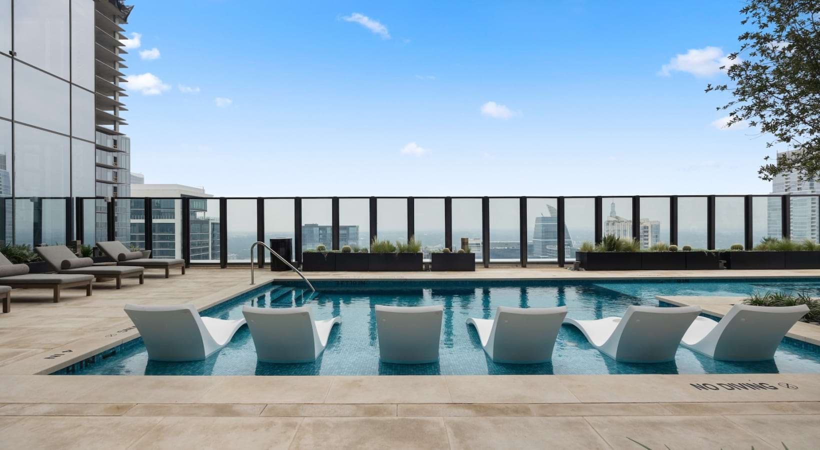 Pool surrounded by the city’s largest indoor-outdoor deck