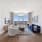 Spacious living room with skyline views