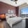 Spacious bedroom with large window