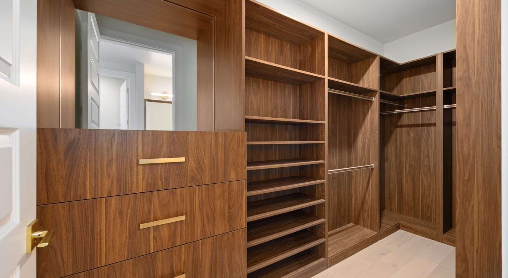 Spacious walk-in closets w/built in shelving & shoe storage