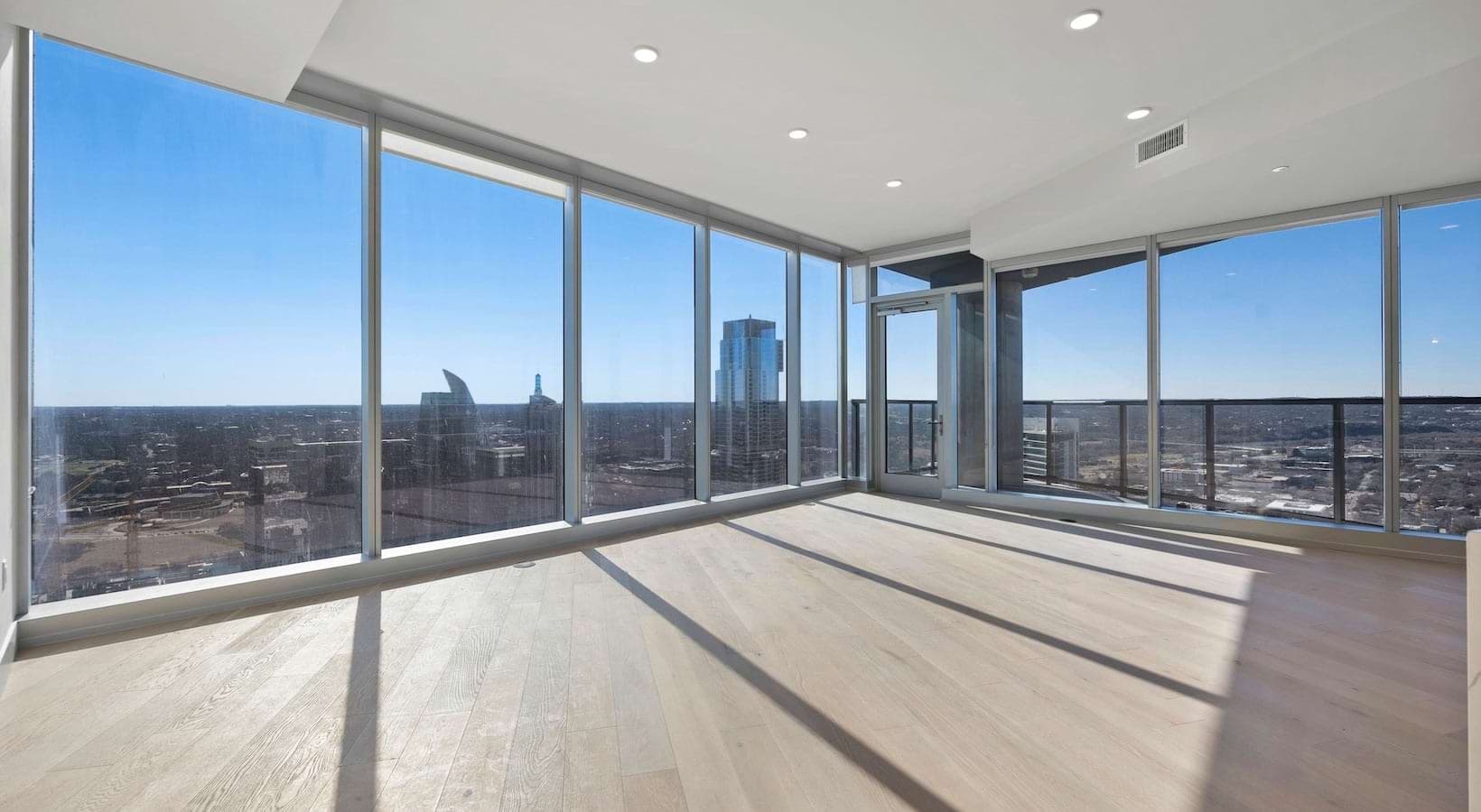 Spacious living room with  skyline views