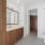 Bathroom with Walnut Cabinets with White Countertops