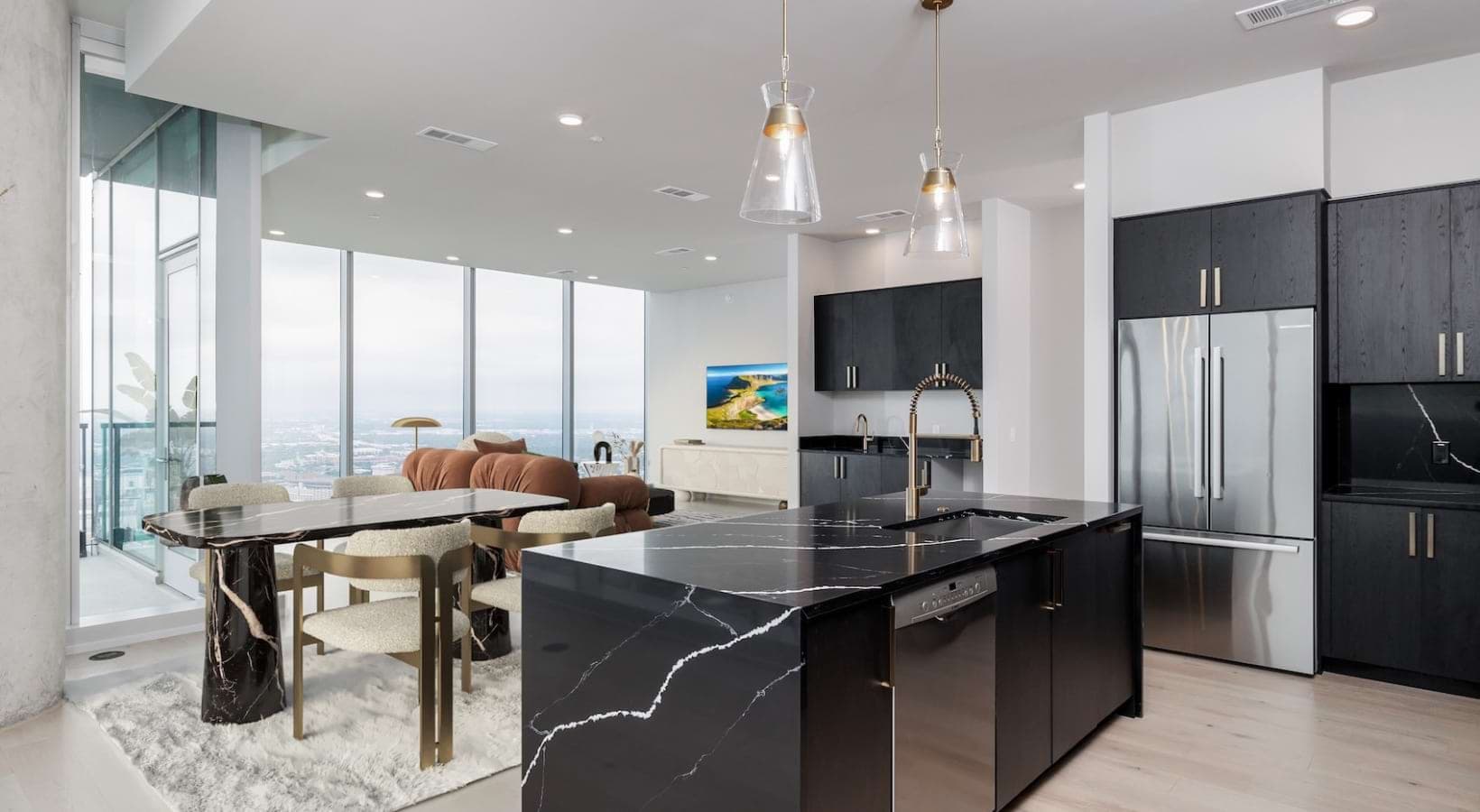 Black cabinets with gold finishes