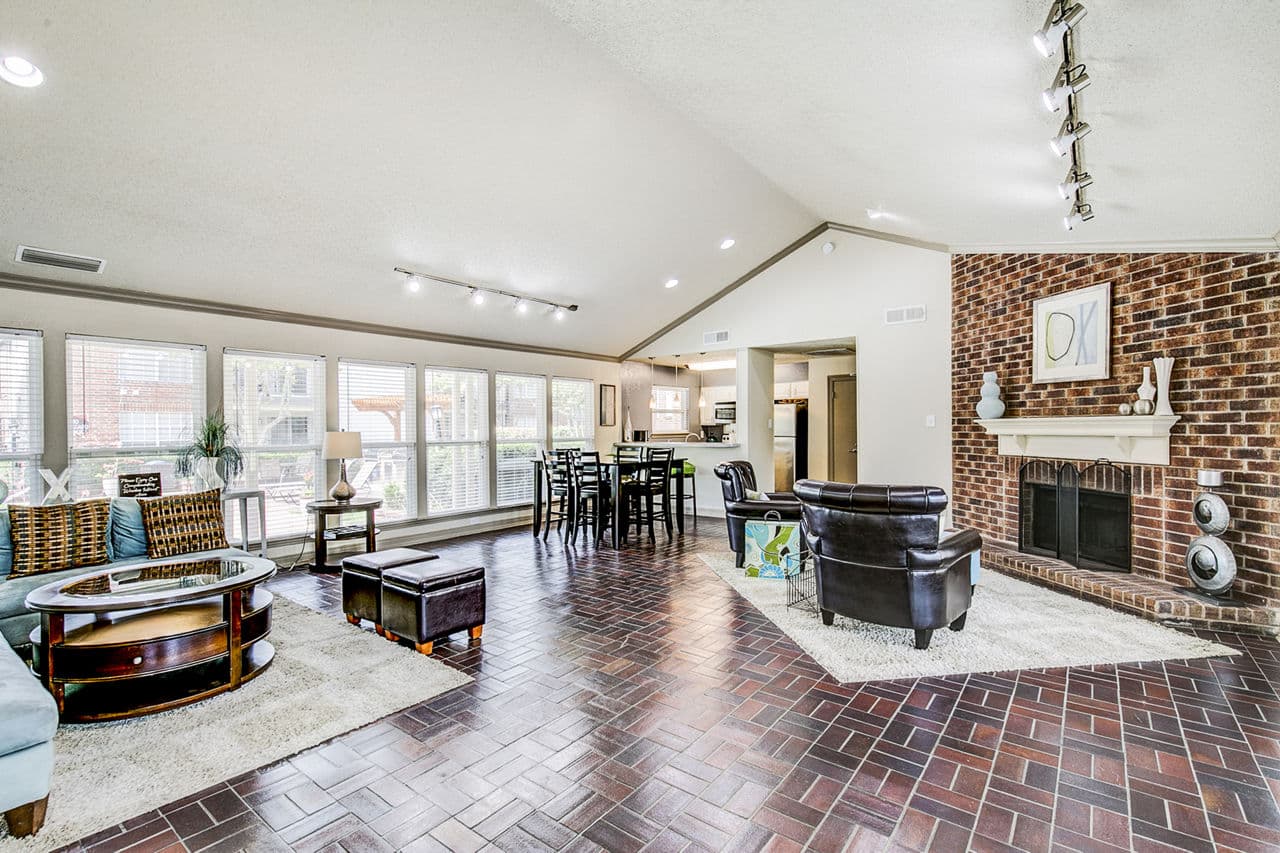 Clubhouse lobby with elegant decor and seating at The Georgian Apartments