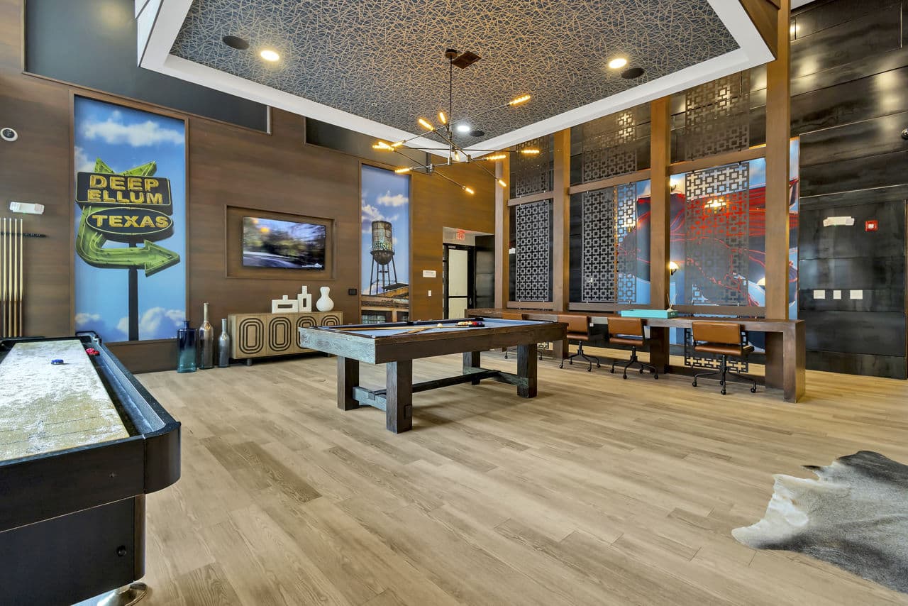 Game room with pool table and lounge area