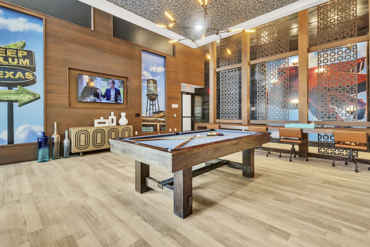 Game room with pool table and modern decor