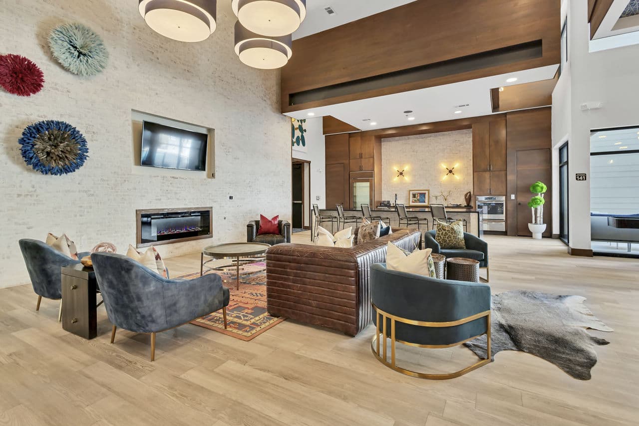 Modern clubhouse featuring lounge seating and billiards table
