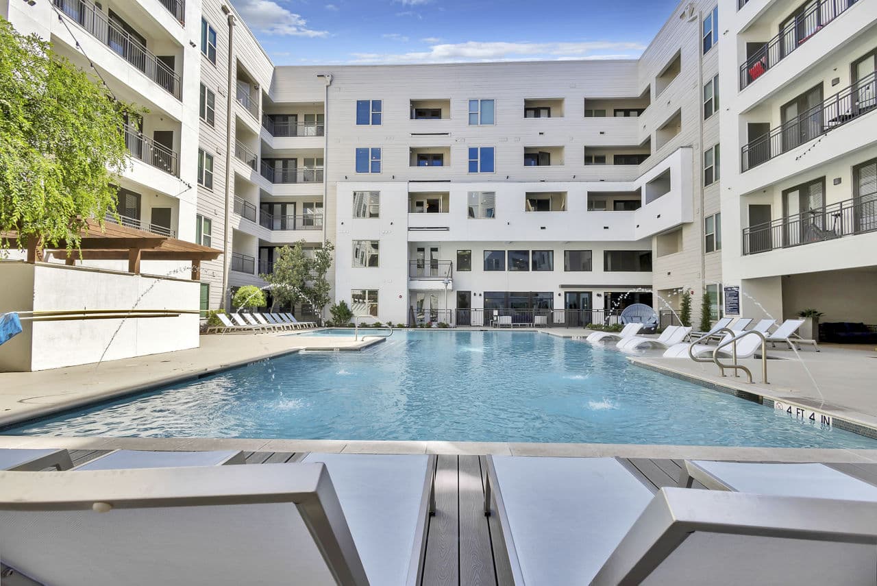 Rooftop pool with city views at Oak & Ellum luxury apartments