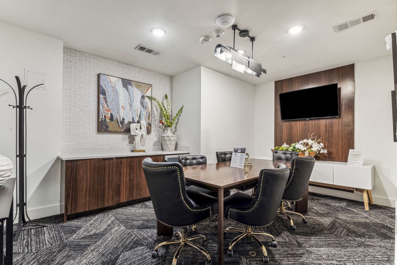 Spacious meeting facility with modern furnishings at Gallery at Turtle Creek Apartments