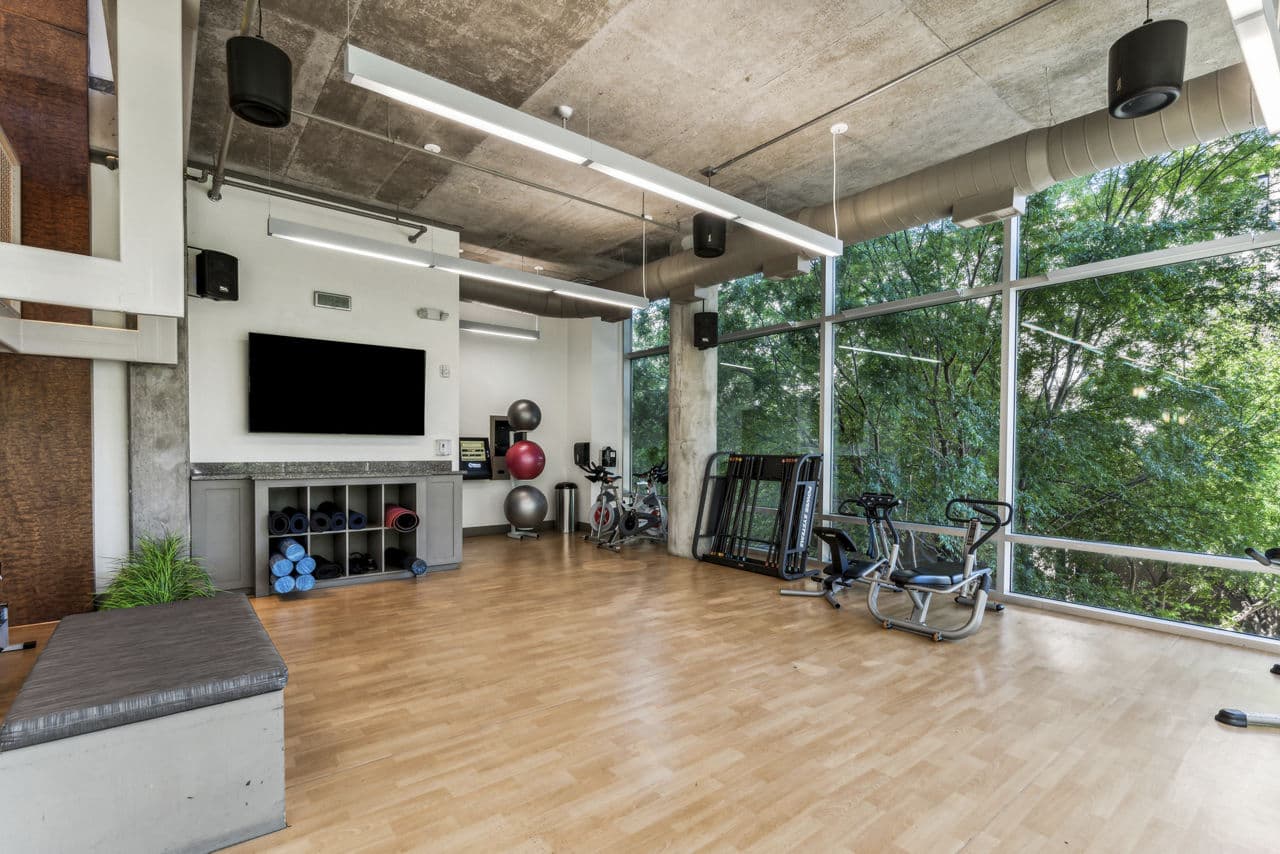 Fitness center at Gallery at Turtle Creek Apartments