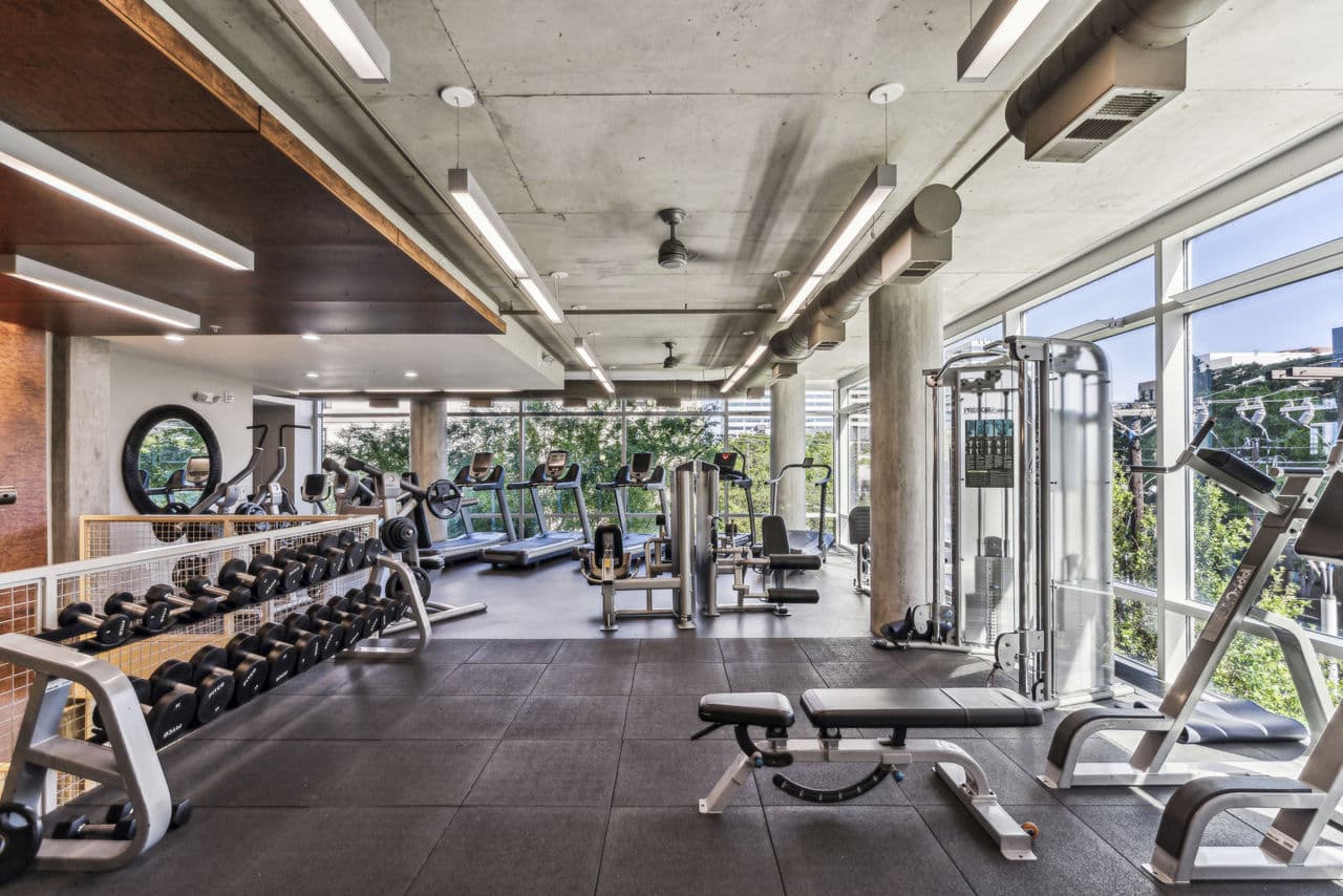 Fitness center at Gallery at Turtle Creek Apartments
