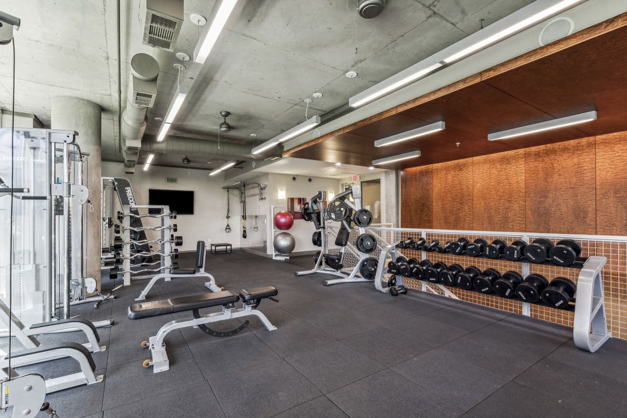 Fitness center at Gallery at Turtle Creek Apartments