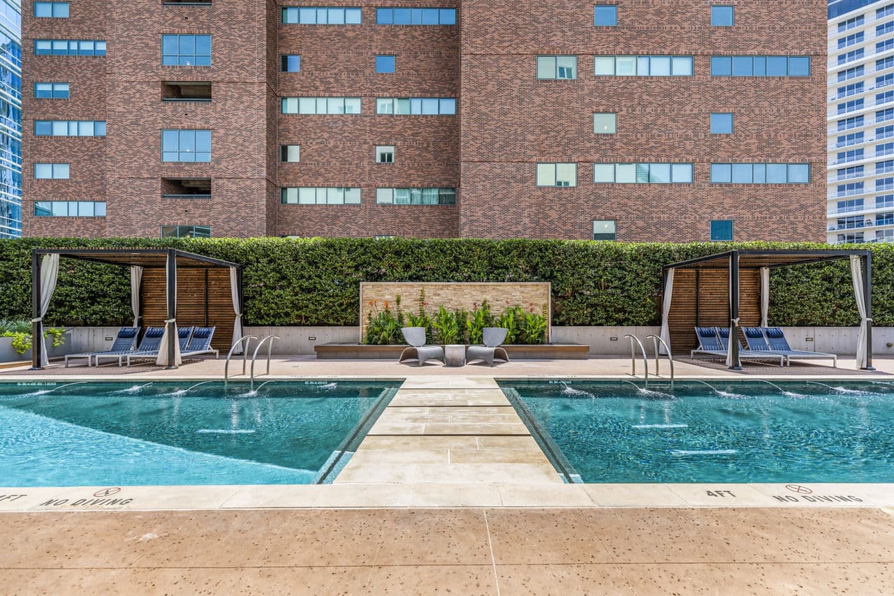Luxurious outdoor pool area at Miro Apartments