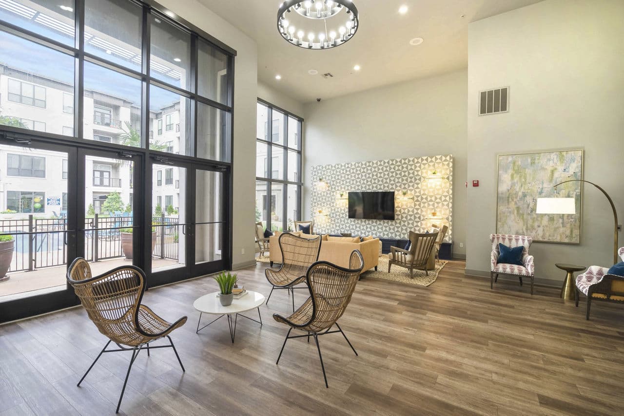Clubhouse featuring modern furnishings at Seville Uptown Apartments