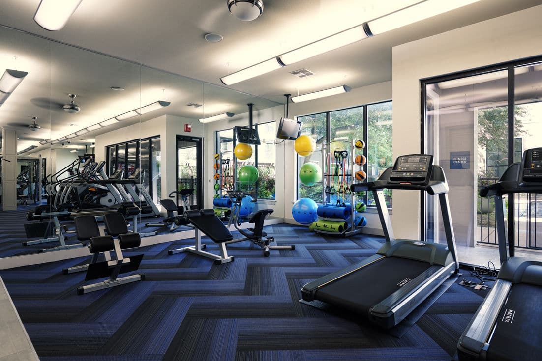 Fitness center at Seville Uptown Apartments