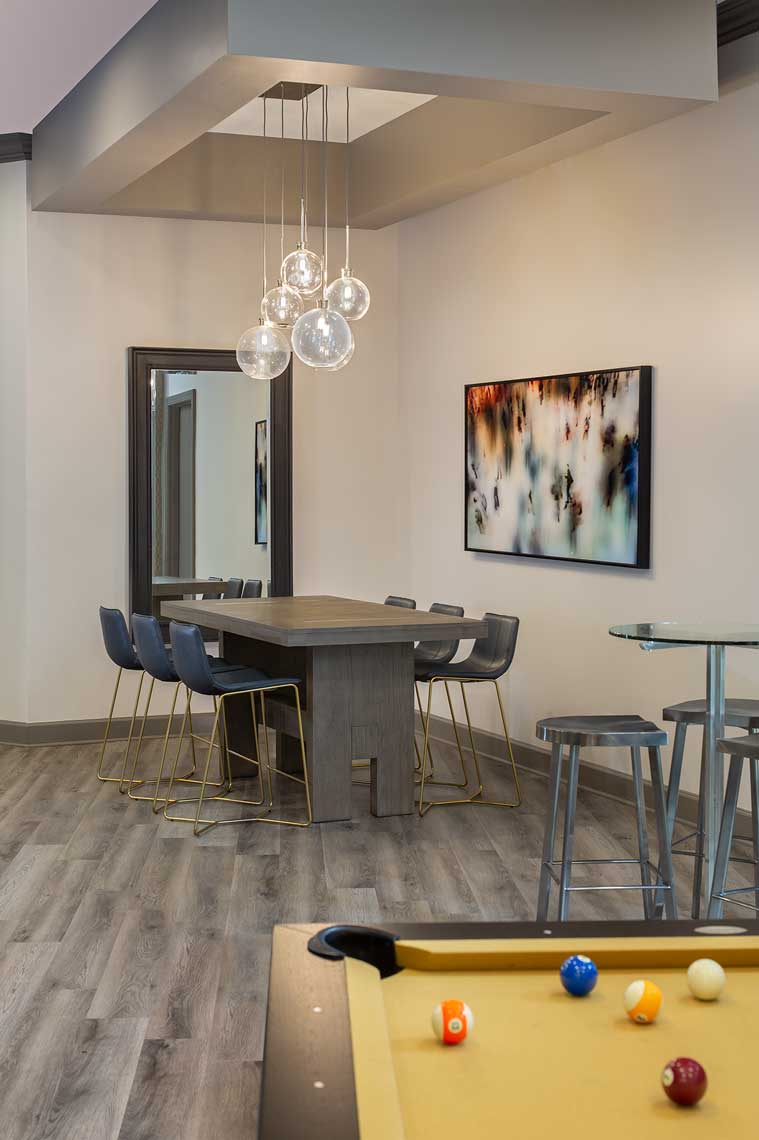 lounge area view from billiard table with various seating and decor