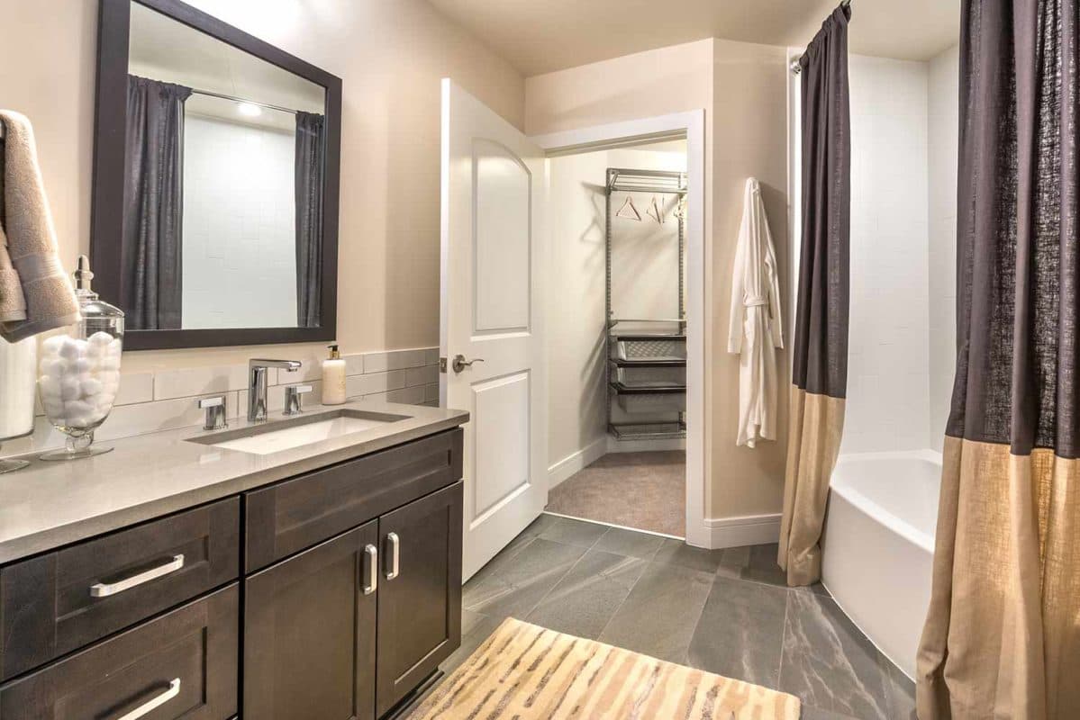 Large bathroom with soaking tub and walk in closet