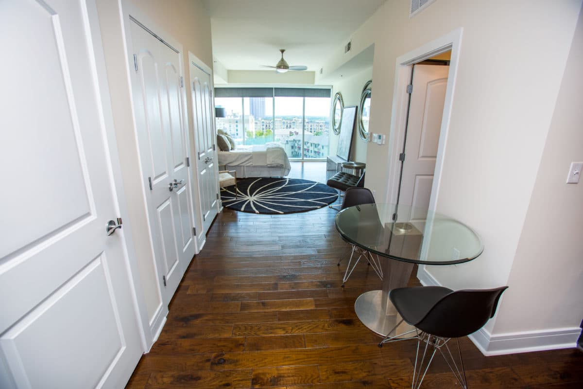 Apartment home with floor-to-ceiling windows and multiple storage areas