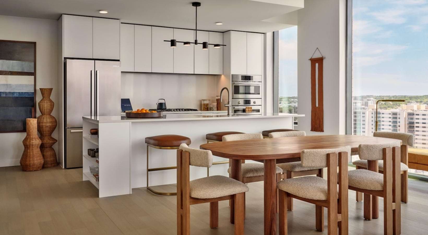 kitchen and dining area with ample lighting