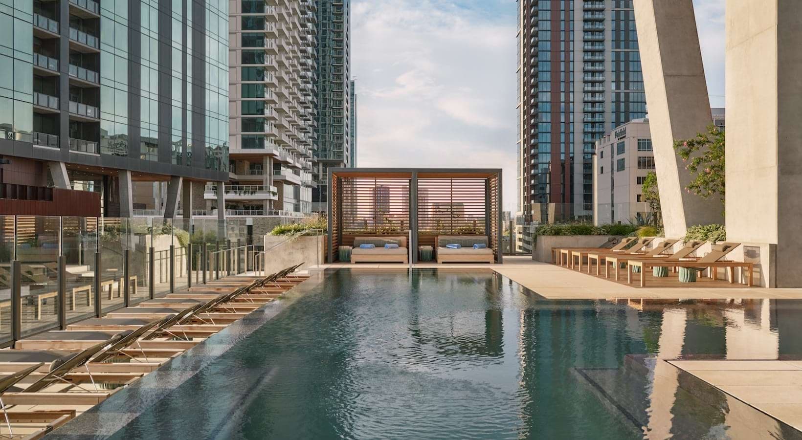 swimming pool with lounge chairs