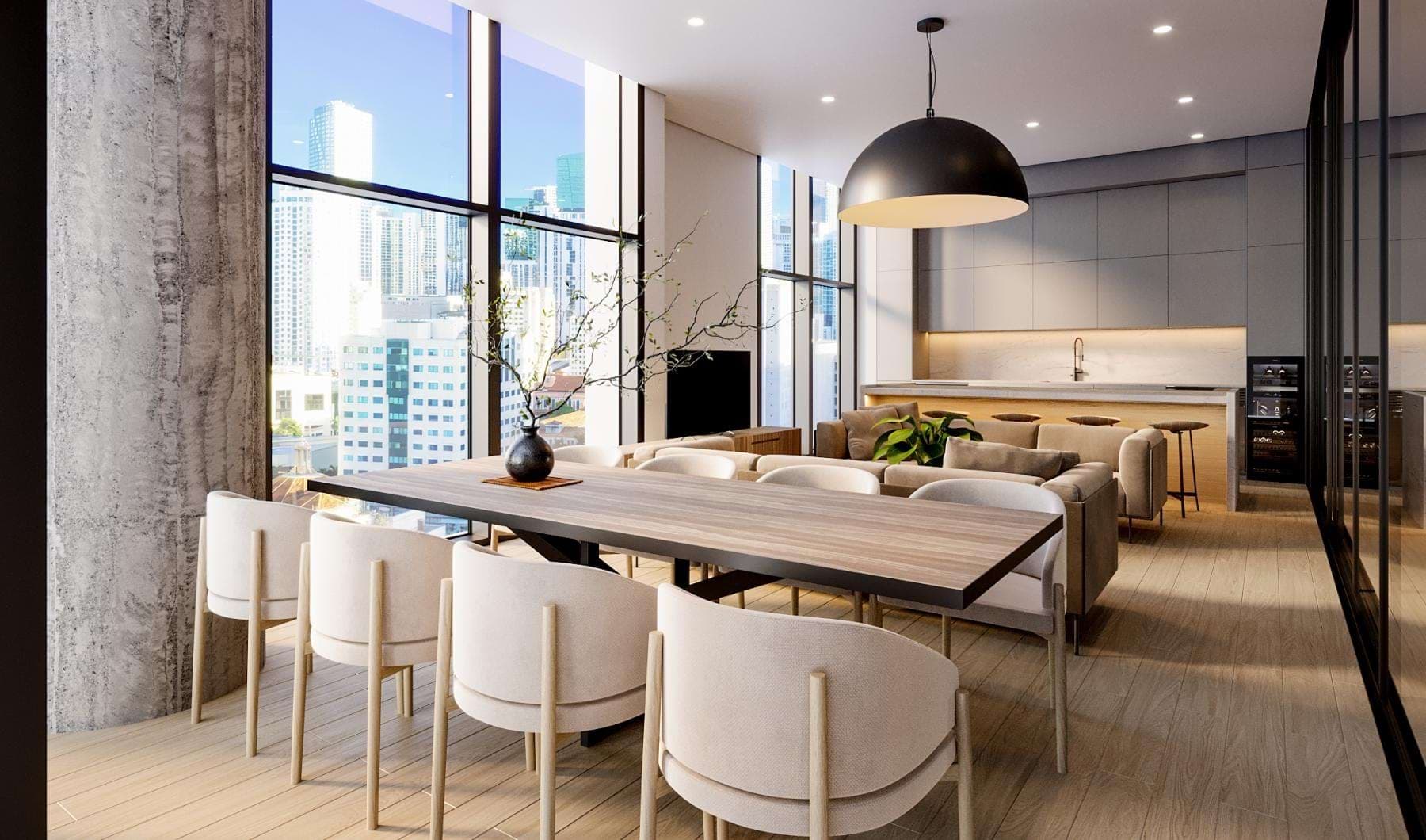 a room with a table and chairs and floor-to-ceiling windows