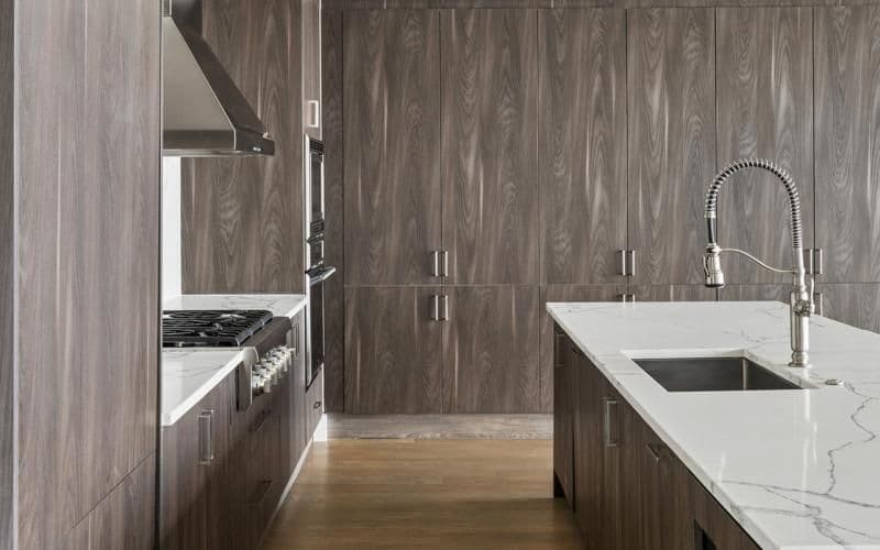 a kitchen with a sink and a stove