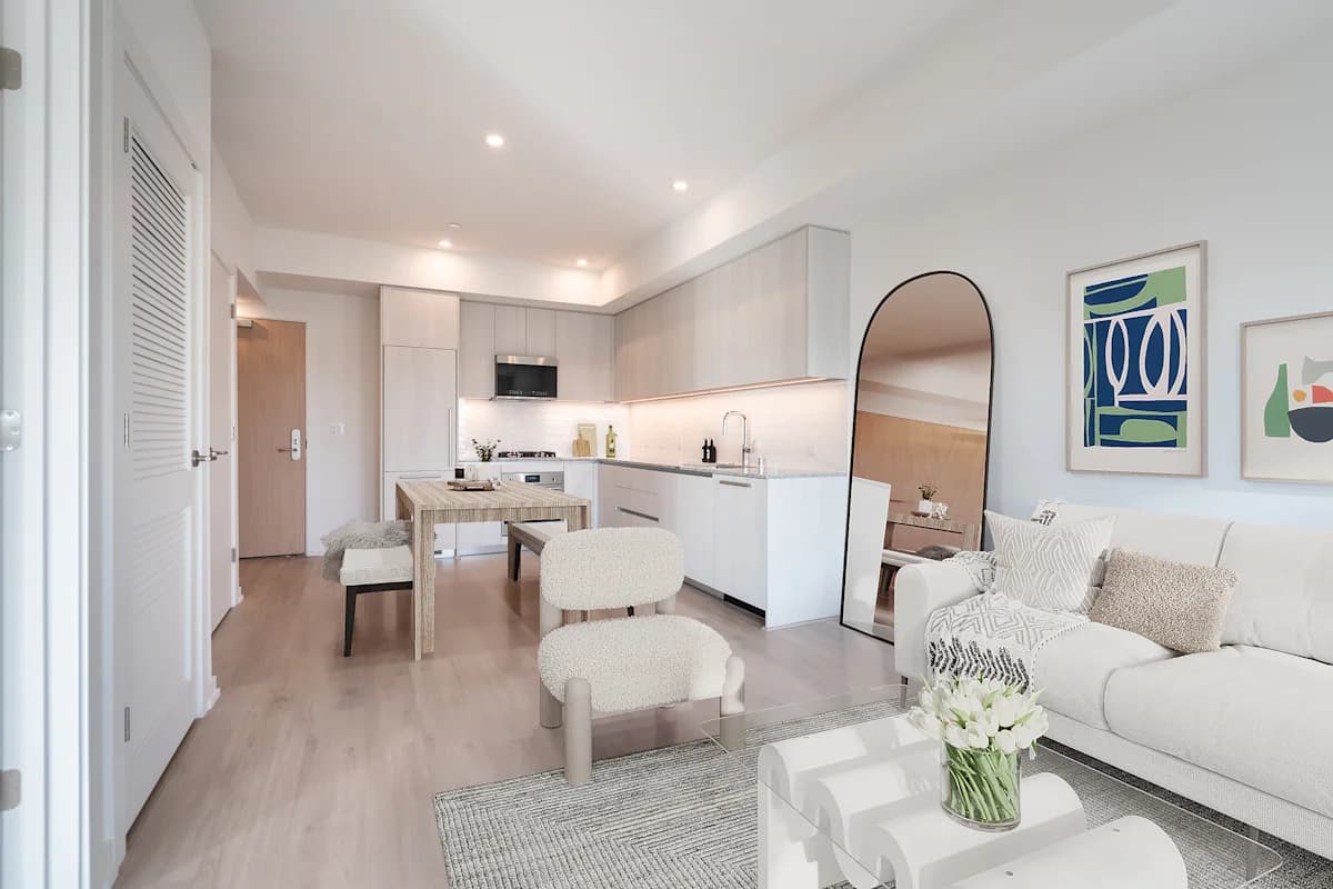 a living room with a couch and a table at SMB Hollywood Apartments, Los Angeles